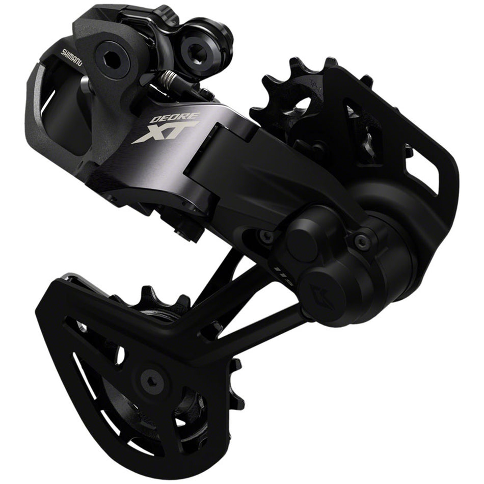 Shimano Deore XT RD-M8150 Di2 rear derailleur with precise shifting mechanism on a bike drivetrain.