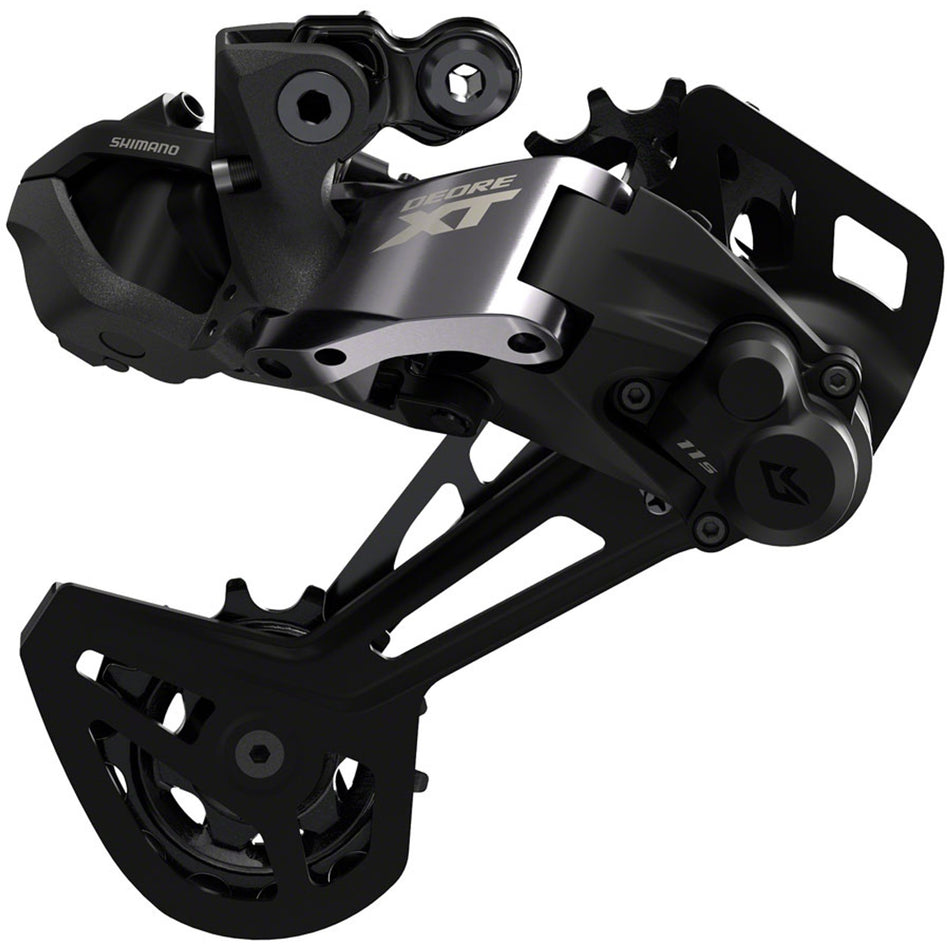 Shimano Deore XT RD-M8150 Di2 rear derailleur mounted on bike, showing sleek black design and precise gear shifting components.