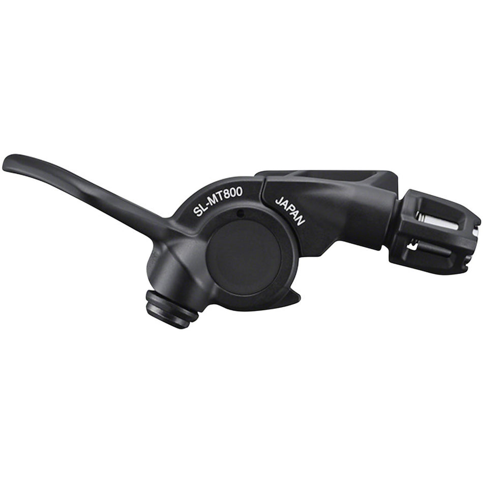 Shimano XTR SL-MT800 dropper seatpost lever attached to bike handlebar, showing ergonomic design for mountain biking suspension control.