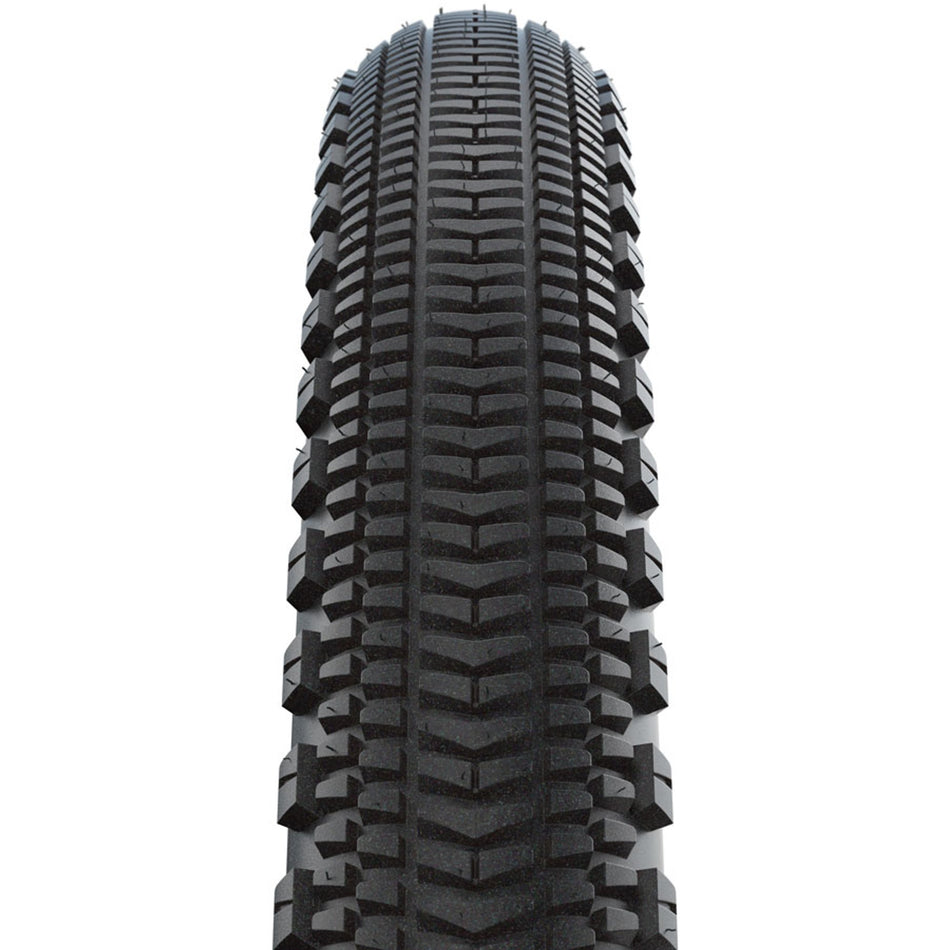Schwalbe G-One Overland folding tubeless-ready gravel and cyclocross tire with knobby tread for off-road riding.