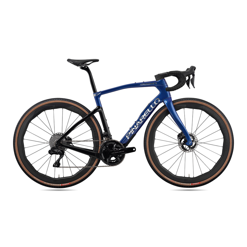 Pinarello Dogma GR gravel bike with Sram Red XPLR 1x13 drivetrain and Princeton Grit 4540 blue shiny frame.