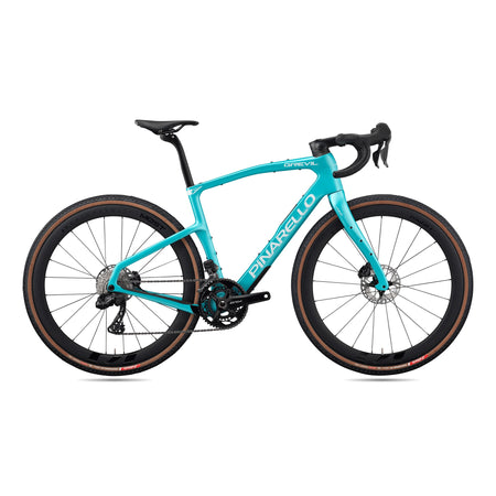 Pinarello MY26 Grevil F7 Force AXS gravel bike in teal, featuring carbon frame and gravel cyclocross design.