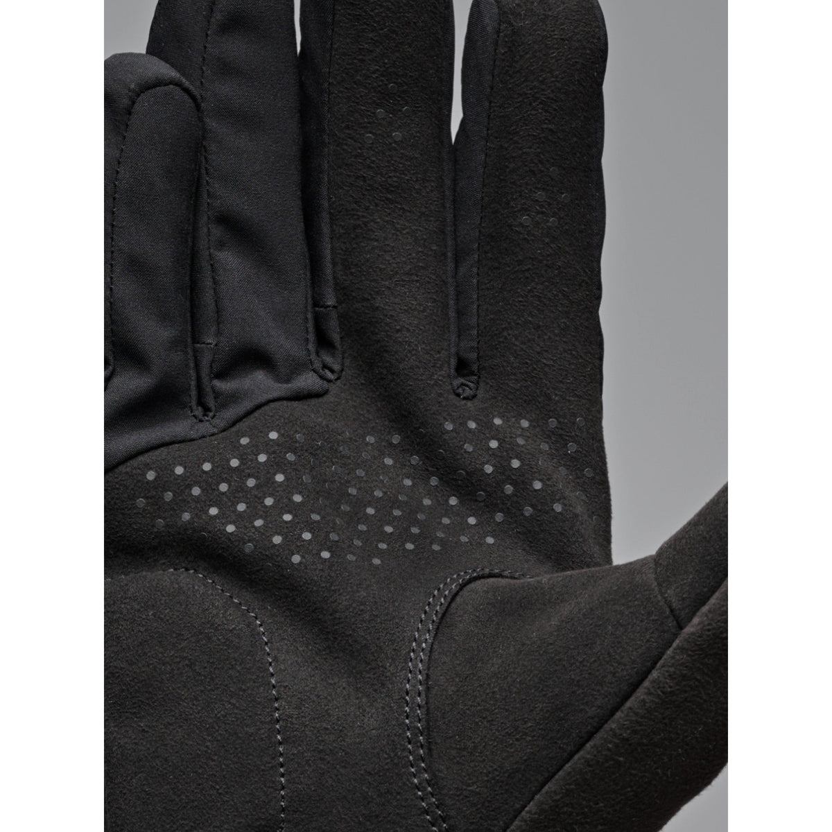 MAAP Control winter glove in black, showing insulated cycling glove design and textured palm grip