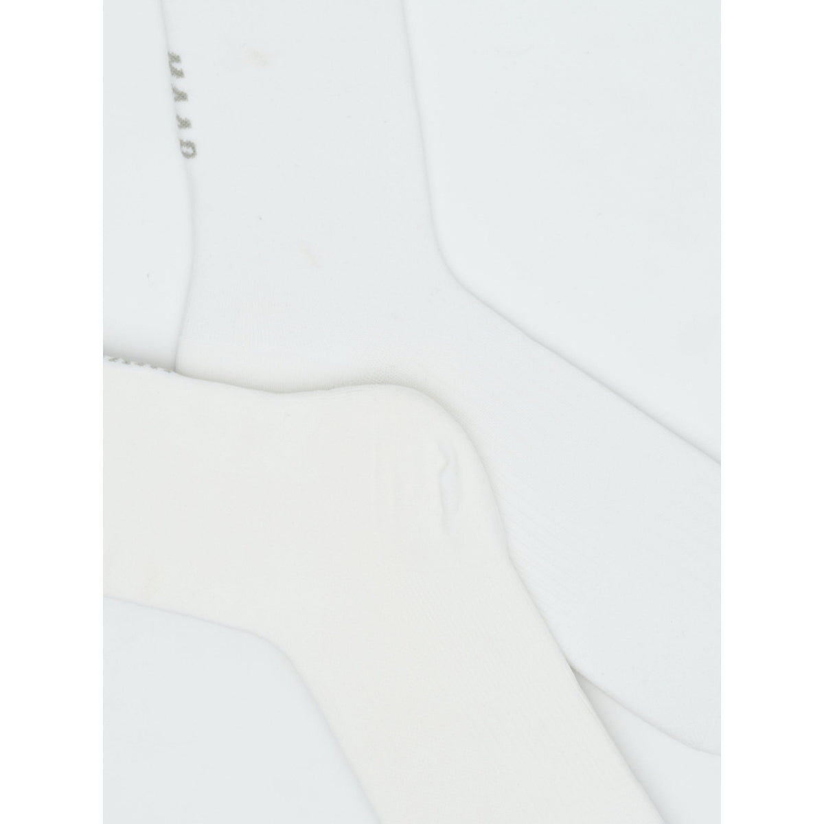 MAAP Team Sock Long cycling socks in white, shown flat from the side