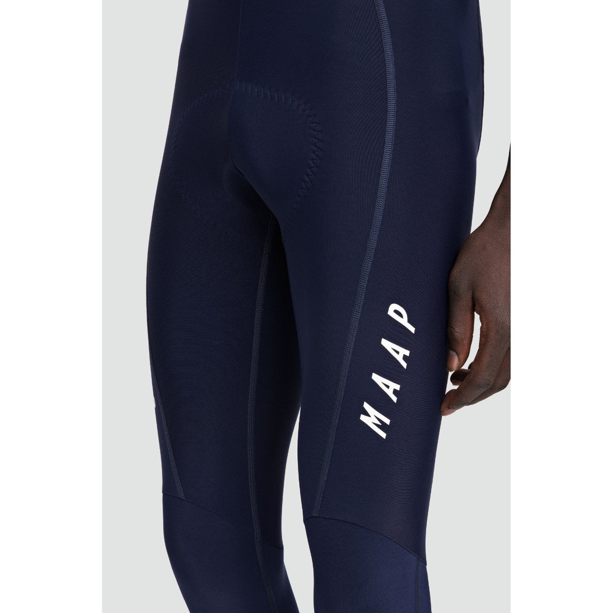 MAAP Team Evo Thermal Bib Tight in navy with padded cycling bib design shown from the side