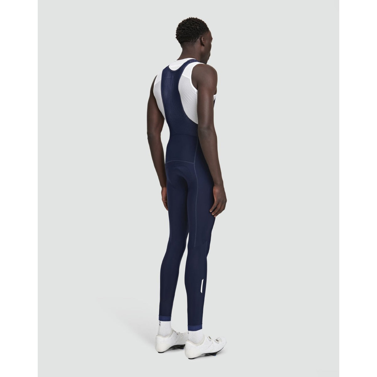 MAAP Team Evo Thermal Bib Tight in navy, shown front view with padded cycling bib straps and thermal fabric