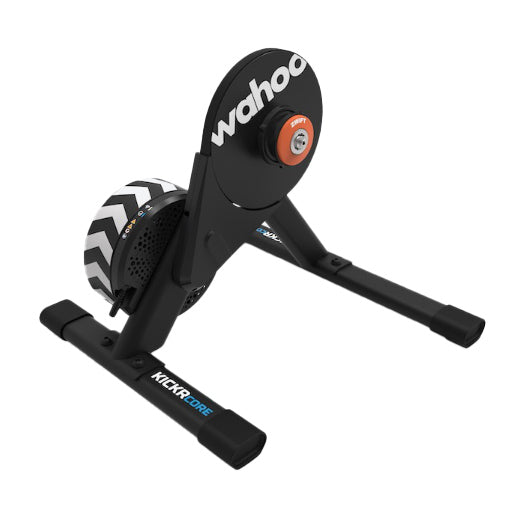 Wahoo Fitness KICKR CORE 2 smart trainer with Zwift Click and cog, mounted on a bike trainer stand for indoor cycling workouts.