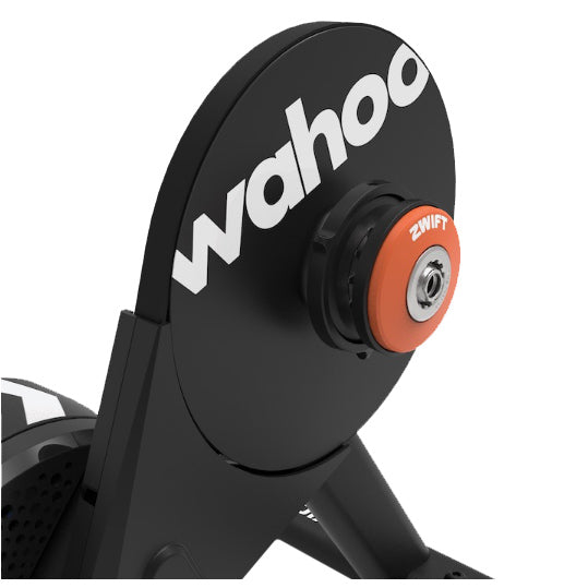 Wahoo Fitness KICKR CORE 2 smart trainer with Zwift Click and Cog, showing the bike mount and digital display in a detailed view.
